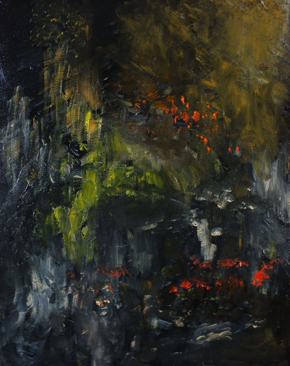 Deep olive foliage scattered with small fires of orange-red blossom
